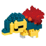 Toy figure made of interlocking bricks in blue, red, and yellow on a white background