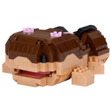 Toy figure made of interlocking bricks on a white background