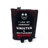 Black book plush with a monster face and text on a white background