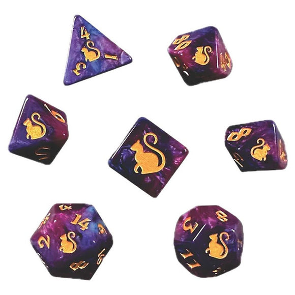 Set of purple dice with gold cat designs on a white background