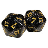 Two black dice with gold numbers on a white background