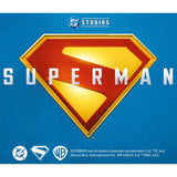 Superman logo with 'Studios' text on a blue background