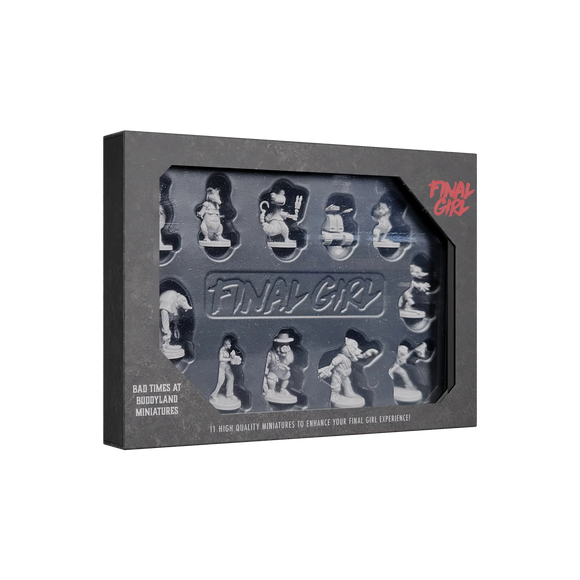 Box of 'Final Girl' miniatures with character figures inside on a white background