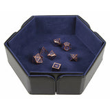 Hexagonal dice tray with blue interior holding metallic dice on a white background