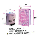 Plush book-shaped pillow with dimensions and text on a white background