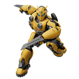 A yellow and gray robot action figure posed dynamically with a large gray weapon, shown on a plain white background.