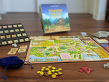 Board game setup with 'Stardew Valley' board game box in the background