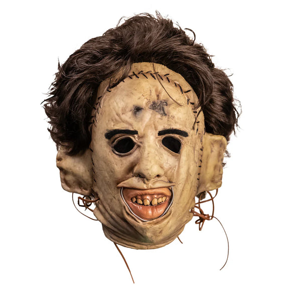 Scary mask with brown hair on a white background