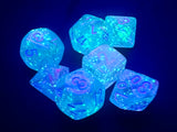 Set of glowing blue dice on a dark background