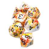 Set of dice with orange, yellow, and white marbled pattern on a white background