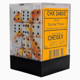 Dice block with sunset design in a Chessex branded box