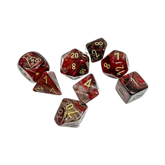Set of red and gold polyhedral dice on a white background