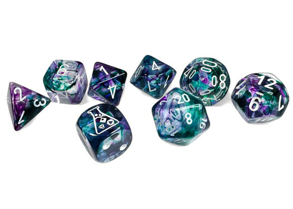 Set of dice with purple and teal colors on a white background