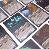 Close-up of game cards with text and graphics on a white background
