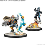 Two miniature figures on stands with a white background