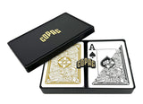 Cupac playing cards with black and gold design on a white background