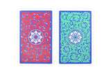 Two decorative playing cards shown side by side on a plain white background. The left card has a red ornamental pattern with a white and blue floral center, and the right card has a green ornamental pattern with a white and blue floral center.