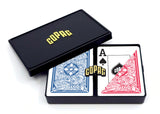 Two decks of Copag playing cards with a black box on a white background
