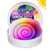 Crazy Aaron's Thinking Putty with a colorful swirl in a tin on a white background