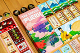 Tea Garden Pu erh board game with colorful tiles on a wooden surface