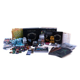 Collection of board game components including cards, dice, and rulebooks on a white background
