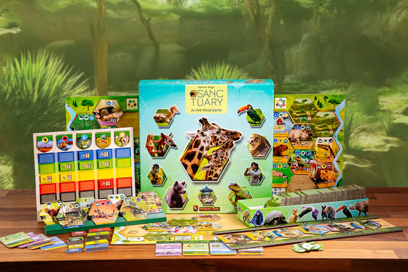 Board game set with animal-themed cards and board on a wooden table.