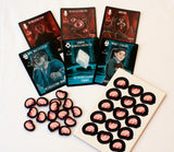 Collection of themed cards and brain-shaped candies on a white background