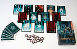 Arkham Ritual game components including cards and tokens on a white background