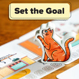 Card game with a cat illustration and 'Set the Goal' text on a wooden surface