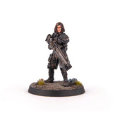 Miniature figurine of a warrior with armor and weapon on a white background