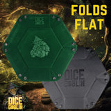 Two hexagonal dice trays, one green and one gray, with 'Dice Goblin' branding on a fantasy-themed background.