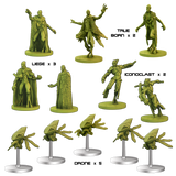 Collection of green figurines on white background