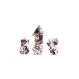 Set of polyhedral dice with red and black numbers on a white background