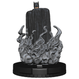 Batman figurine with a dark background on a white platform