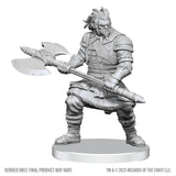 Unpainted miniature figure of a warrior with an axe on a white background