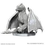 White dragon figurine on a white background with 'Wizards of the Coast' branding.