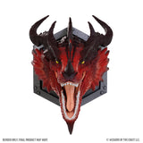 Red dragon head sculpture with black horns on a white background