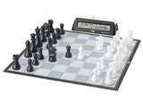 Chessboard with black and white pieces and a digital clock on a white background