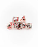 Set of dice with red and black numbers on a white background