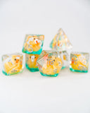 Set of dice with cartoon character design on a white background