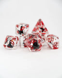 Set of transparent dice with red and black numbers on a white background