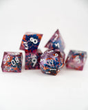 Set of colorful polyhedral dice on a white background