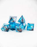 Set of blue and red dice with star patterns on a white background