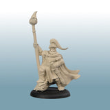 Unpainted miniature figurine of a warrior with a spear on a gradient background