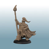Minature figurine of a warrior with a spear on a gradient blue background