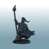 Dark gray fantasy warrior figurine with a spear on a light blue background