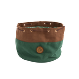 Green and brown fabric basket with a circular logo on a white background