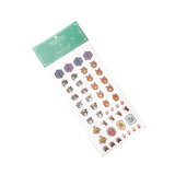 Sheet of decorative stickers with various designs on a white background