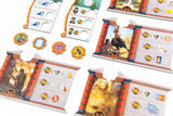 Board game components with decorative elements on a white background