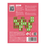 Back of a board game packaging with colorful game pieces on a pink background
